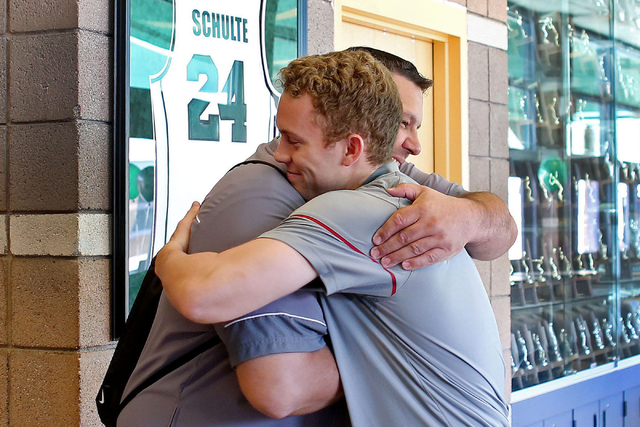 Palo Verde senior Dylan Orlando hugs his baseball coach Joe Hallead at Palo Verde High Schoo ...