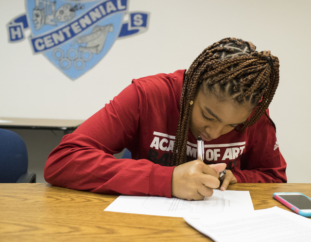 Megan Jefferson signs a letter of intent at Centennial High School in Las Vegas on Wednesday ...