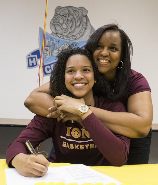 Jayden Eggleston, left, and her mother, Camisha Gathright, pose during a letter signing even ...