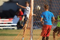 Cimarron-Memorial soccer player Garrick Quackenbush launches a shot during practice Wednesda ...