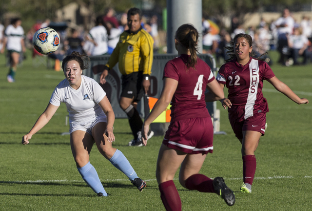Foothill’s Adrianna Garcia (15) watches her shot during the Sunrise Region girls socce ...