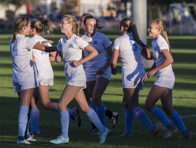 Foothill players celebrate after scoring a goal during the Sunrise Region girls soccer quart ...