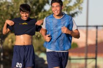 Spring Valley soccer player Jose Lopez, right, jokes around with teammates during practice ...