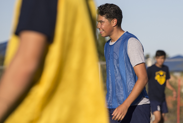 Spring Valley soccer player Jose Lopez (7) jokes around with teammates during practice on We ...