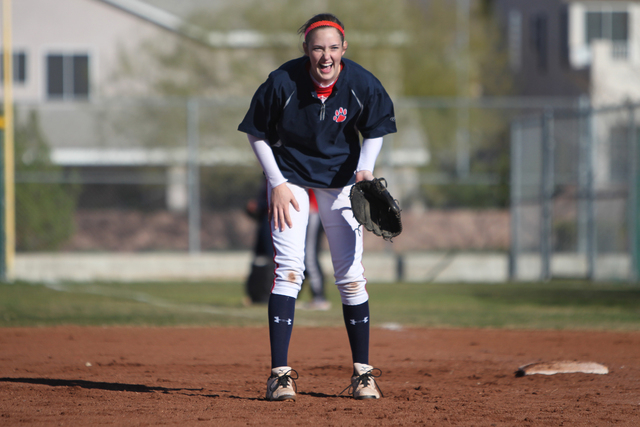 Sarah Pinkston, 16, pitcher for Coronado’s varsity softball team, shares a laugh with ...