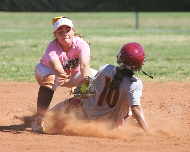 Desert Oasis’ Gemma Perez slides safely into second base under the tag attempt of Dura ...