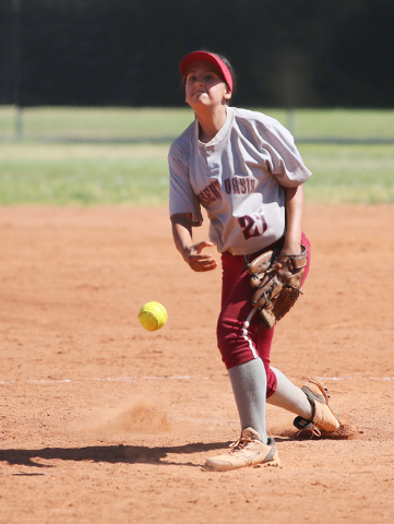 Desert Oasis reliever Elsy Guzman delivers a pitch during Saturday’s game against Dura ...