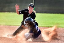 Centennial’s Sonja Lawrence (3) is tagged out trying to steal second base against Palo ...