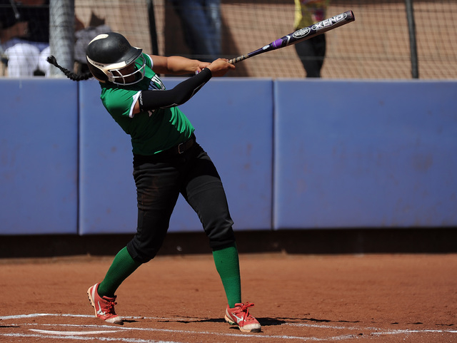 Rancho infielder Tiare Lee hits an RBI double against Bishop Gorman in the first inning of t ...