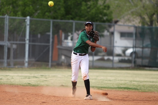 Palo Verde’s Dejanae Gage (2) throws the ball to first base for an out against Rancho ...