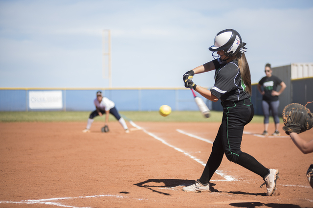 Palo Verde High School’s Mackenzie McBride (18) swings at a pitch against Centennial H ...
