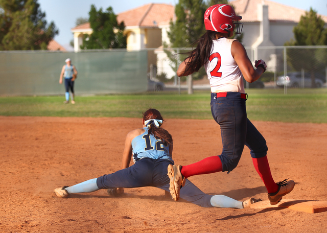 Liberty’s Tiana Tapuala (2) is forced out at first base by Foothill’s Sarah Madd ...