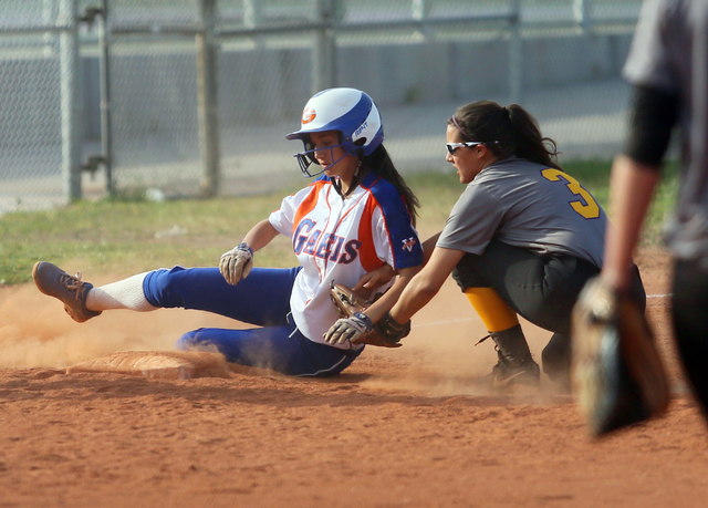 Durango’s Brooke Alves, right, tags Bishop Gorman’s Monique Passalacqua as Passa ...