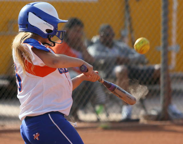 Bishop Gorman’s Ashley Witucki hits the ball during a softball game against Durango at ...