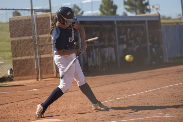 Centennial’s Brianna Benoit (17) swings at a pitch against Arbor View during their sof ...
