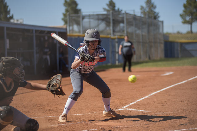Arbor View’s Breanne Henricksen (4) looks at a pitch against Centennial during their s ...