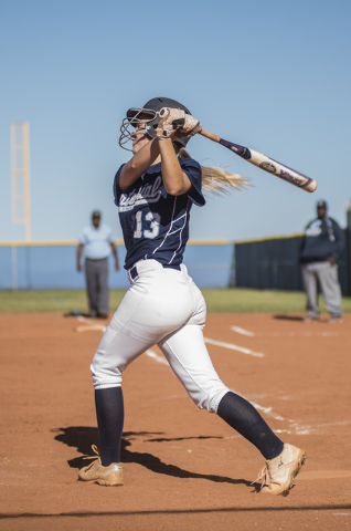 Centennial’s Kara Simpson (13) swings at a pitch against Arbor View during their softb ...