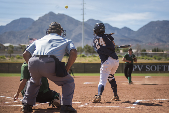 Shadow Ridge’s Justin Garganese (24) hits the ball against Palo Verde during a softbal ...