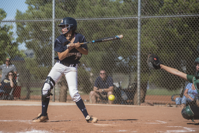 Shadow Ridge’s Justin Garganese (24) reacts after getting hit by the ball against Palo ...