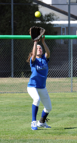 Green Valley girls softball center fielder Maggie Manwarren snags a fly ball at practice. Ma ...
