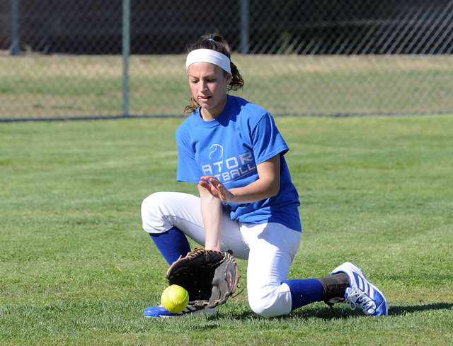 Green Valley girls softball center fielder Maggie Manwarren fields a grounder at a recent pr ...