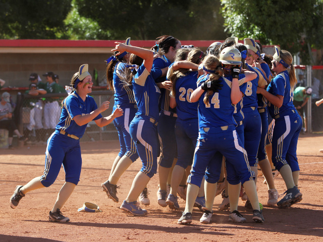 Reed players celebrate their win over Palo Verde after their Division I championship softbal ...