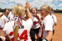 Lincoln County players celebrate their 8-3 win over White Pine County in their Division III ...