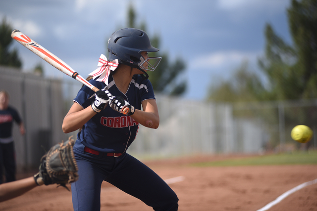 Coronado’s Basia Query (9) swings at a pitch against Rancho during their softball game ...