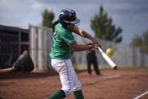 Rancho’s Tiara Lee (22) swings at a pitch against Coronado during their softball game ...