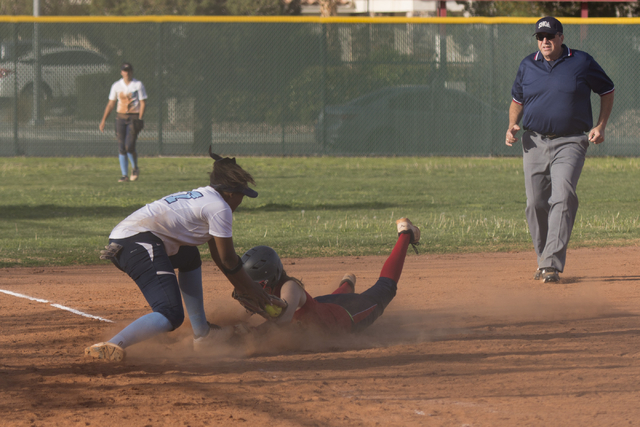 Liberty’s Marisa Olmos slides into third base against Foothill’s Jazmine Dukes d ...