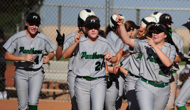 Palo Verde players celebrate after scoring two runs in the third inning to even up the score ...