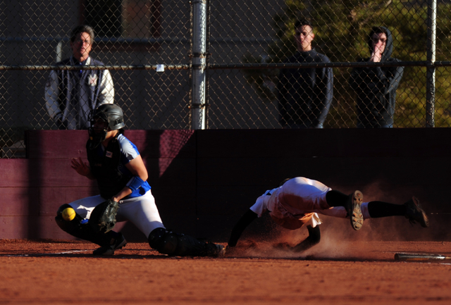 Faith Lutheran base runner Ellie Fried scores the game’s winning run as Sierra Vista c ...