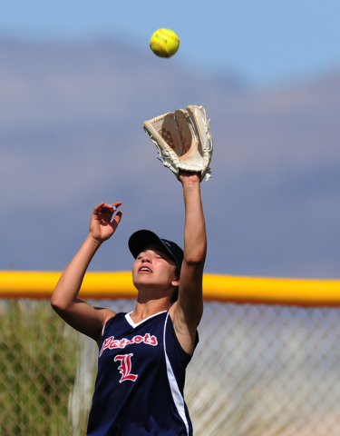 Liberty outfielder Ashleigh Rodriguez catches a Poly (Calif.) pop fly during their prep soft ...