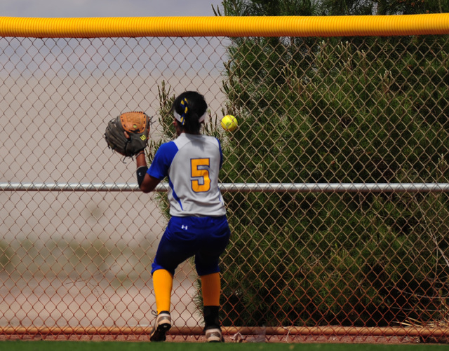 Poly (Calif.) outfielder Isabel Ortiz watches helplessly as Liberty two run home run hit by ...