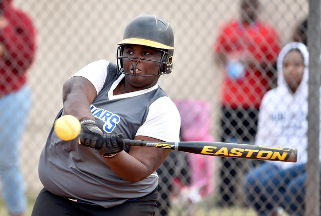 Desert Pines’ Maiya Richardson looks to hit the ball during a high school softball gam ...