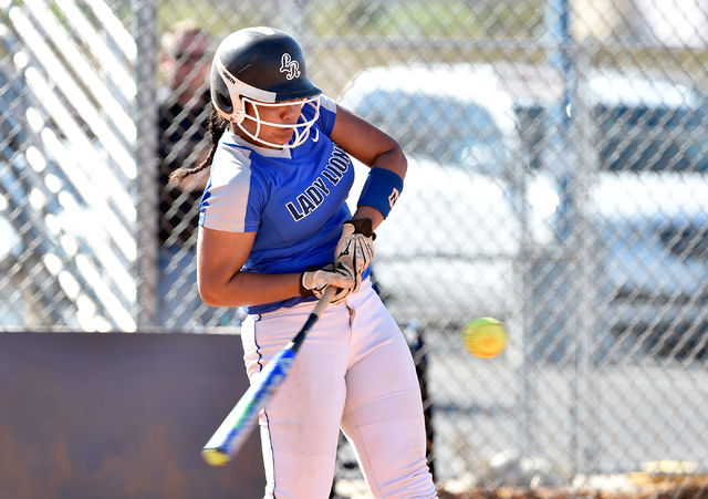 Sierra Vista pitcher Kalei Watkins connects with the ball during a high school softball game ...
