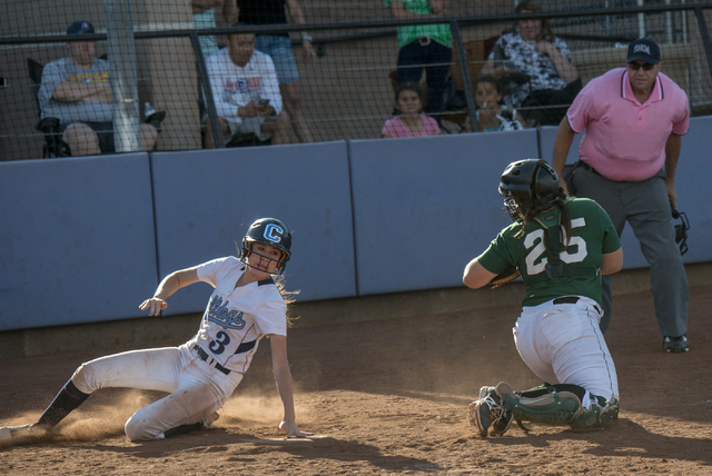 Centennial’s Jasmine Rivera (3) slides safely into home plate as Palo Verde’s Gr ...