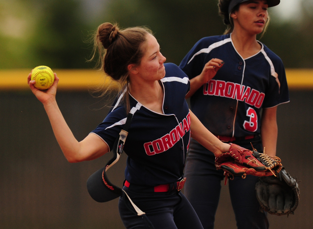 Coronado shortstop Dylan Underwood throws out a Palo Verde baserunner at first base while he ...