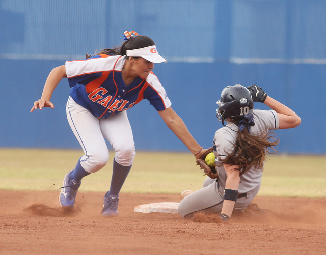Bishop Gorman’s Shelby Estocado, left, tags Centennial’s Stephanie Day as Day st ...