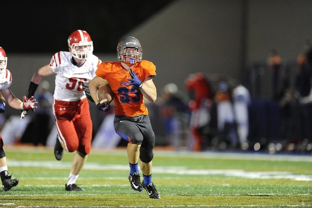 Bishop Gorman’s Jonathan Shumaker runs for a touchdown against Brophy Prep in the firs ...