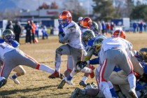 Bishop Gorman’s Biaggio Ali Walsh (7) rushes for a touchdown against Reed in an NIAA D ...