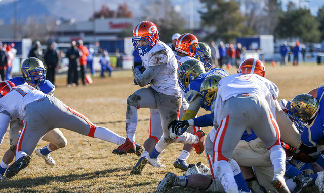 Bishop Gorman’s Biaggio Ali Walsh (7) rushes for a touchdown against Reed in an NIAA D ...