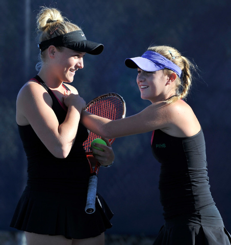 Palo Verde’s Chloe Henderson, left and her sister, Sophie Henderson, share a moment be ...