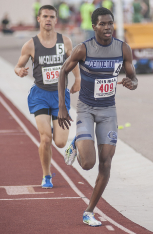 Centennial High School’s Dajour Braxton finishes the D1 1600-meter race in first place ...