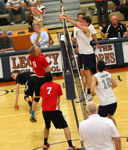 Legacy’s Tanner Compton (1) blocks an attack from Las Vegas’ Chris Kampshoff (9) ...