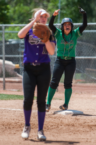 Kat Anthony (27) , catcher for Rancho, celebrates getting onto first base after performing a ...