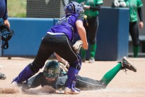 Rancho’s Kayla Coles (8) is tagged at home plate by Spanish Springs’ Kourtney To ...