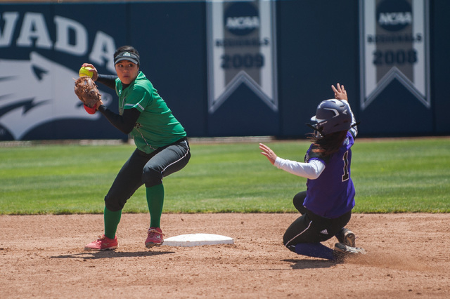 Tiare Lee (22), Rancho’s second baseman, throws to first base after tagging out Spanis ...