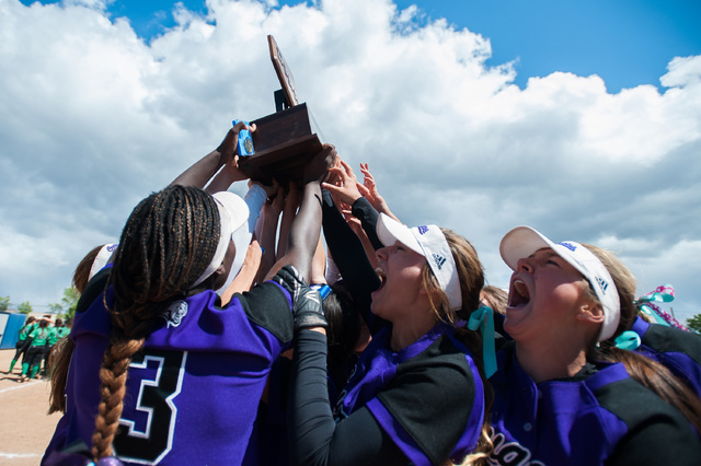 Spanish Springs celebrates their win over Rancho during the NIAA DI softball championship at ...