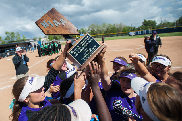 Spanish Springs celebrates their win over Rancho during the NIAA DI softball championship at ...